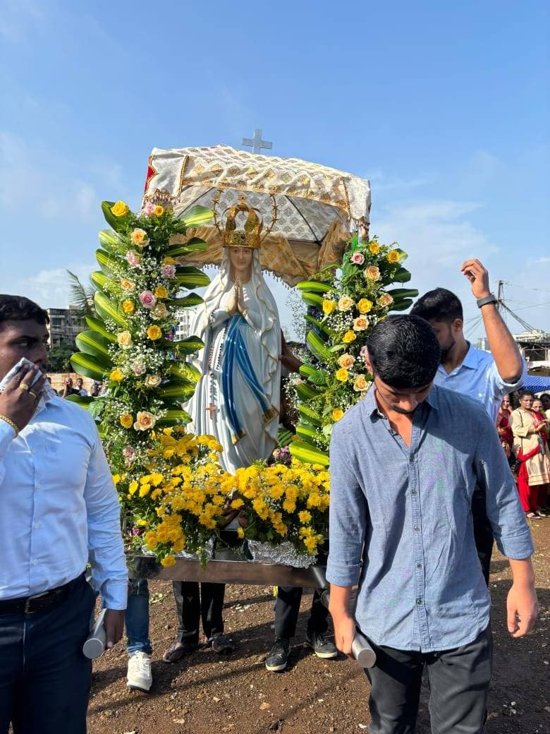 The statue of Our Lady carried in a decorated palanquin